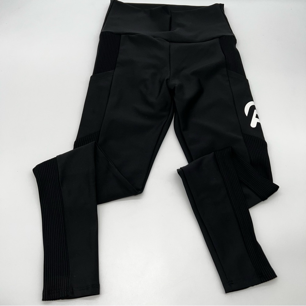 Peloton Women’s Black Leggings with white Branding on Side Pocket-Size S